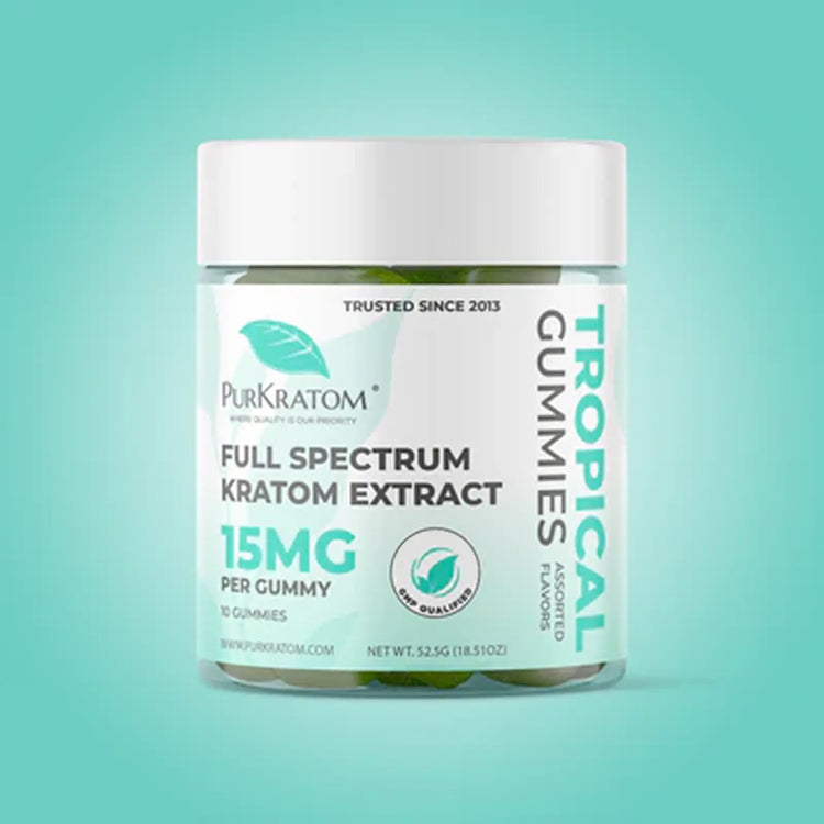 An image of the PurKratom Full Spectrum Extract Tropical Kratom Gummies 15 MG in a professional studio with teal background and white jar.